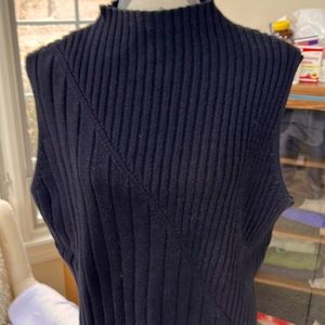 Great black s/less 55% ramie and 45% cotton. Nice  heavy sweater to wear alone